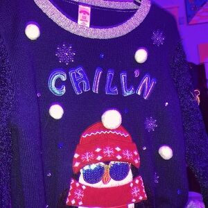 Christmas sweater. With a penguin on it